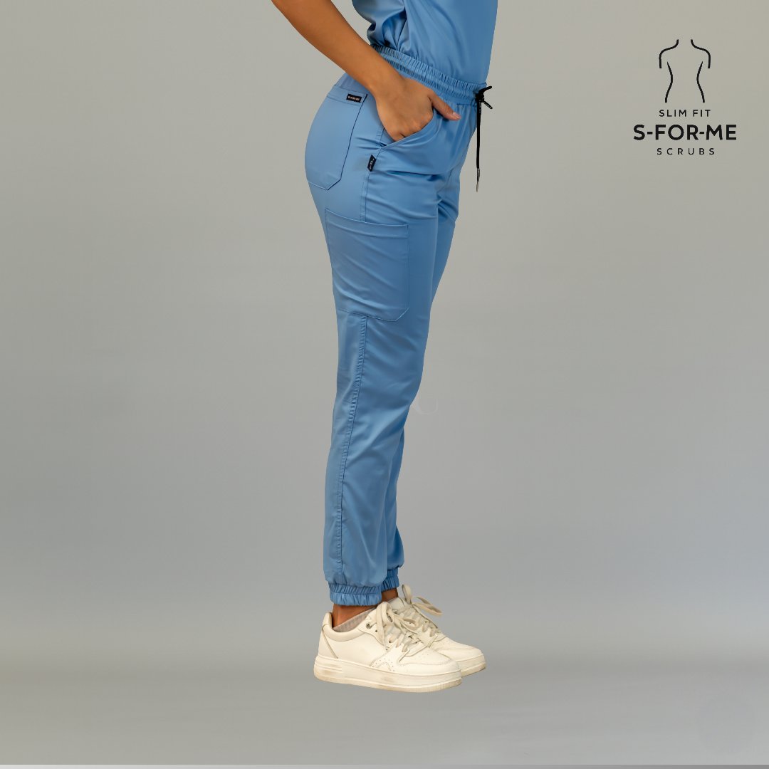 Women’s ceil blue scrub joggers side profile with drawstring waist and utility pocket