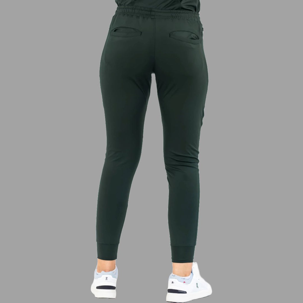 Straight back view of women's scrub joggers 920 super stretch bottle green highlighting the fit.