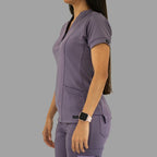 Women's light purple Style 930 scrub top, side profile view