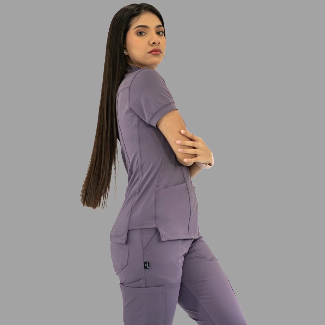 Women's light purple Style 930 scrub top, side view with arms crossed