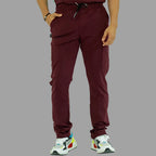 Front view of men’s maroon medical scrub pants with elastic waist and drawstring
